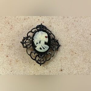 Vintage Cameo Brooch with Black and White Design